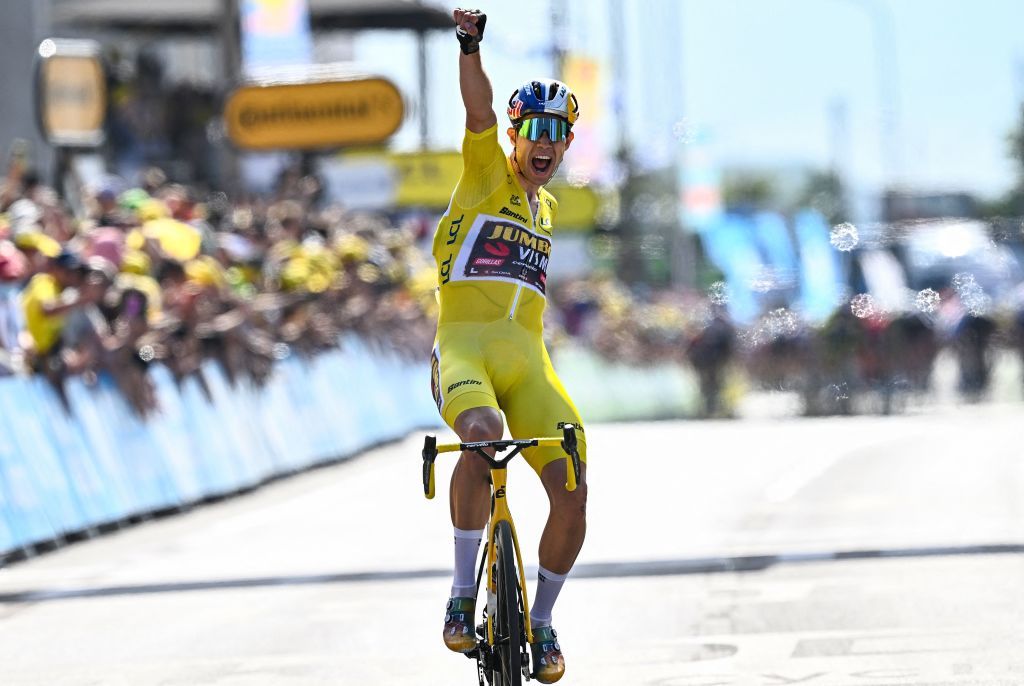 JumboVisma teams Belgian rider Wout Van Aert celebrates as he cycles past the finish line to win the 4th stage of the 109th edition of the Tour de France cycling race 1715 km between Dunkirk and Calais in northern France on July 5 2022 Photo by AnneChristine POUJOULAT AFP Photo by ANNECHRISTINE POUJOULATAFP via Getty Images