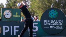 Caleb Surrat hits a tee shot at the PIF Saudi International golf tournament on the Asian Tour