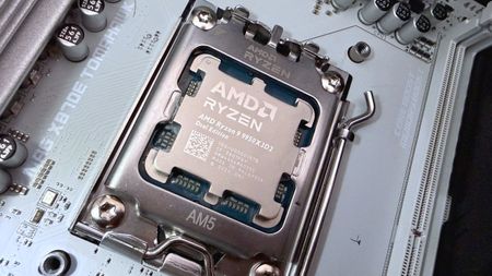 A photo of an AMD Ryzen 9 9950X3D2 Dual Edition processor mounted in a motherboard CPU socket