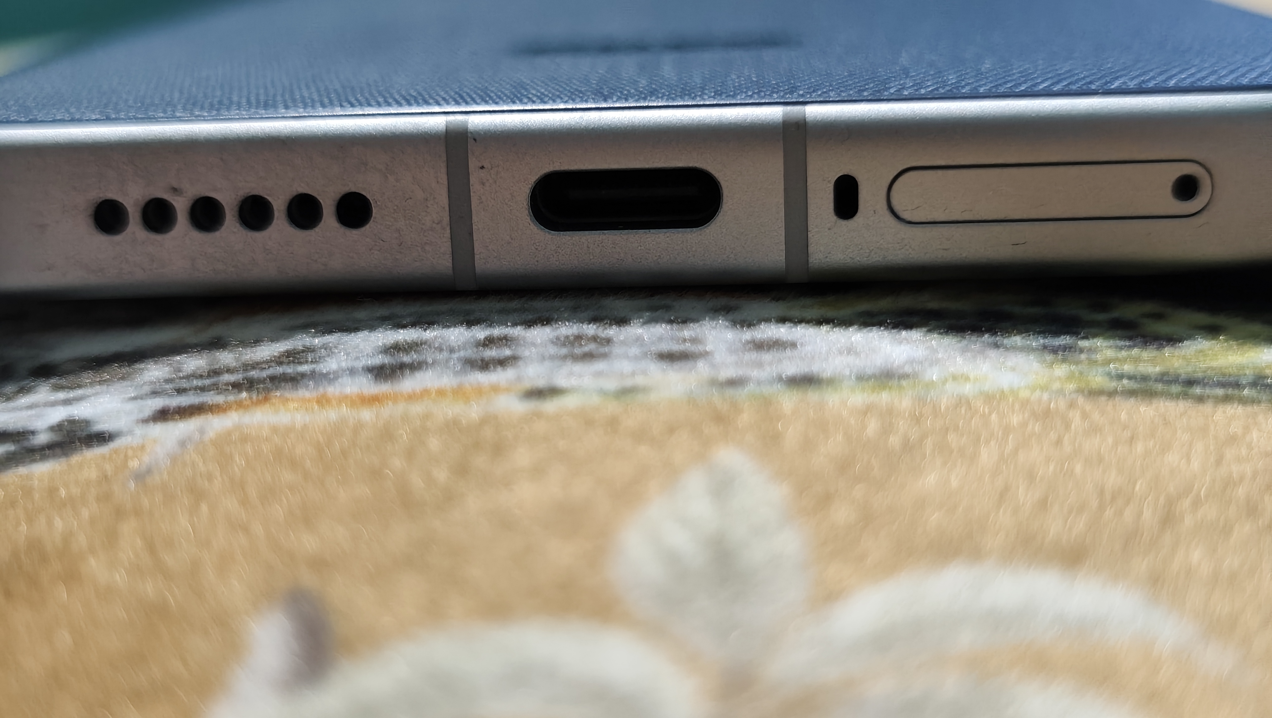 A Poco F8 Ultra on a flower-decorated pillow