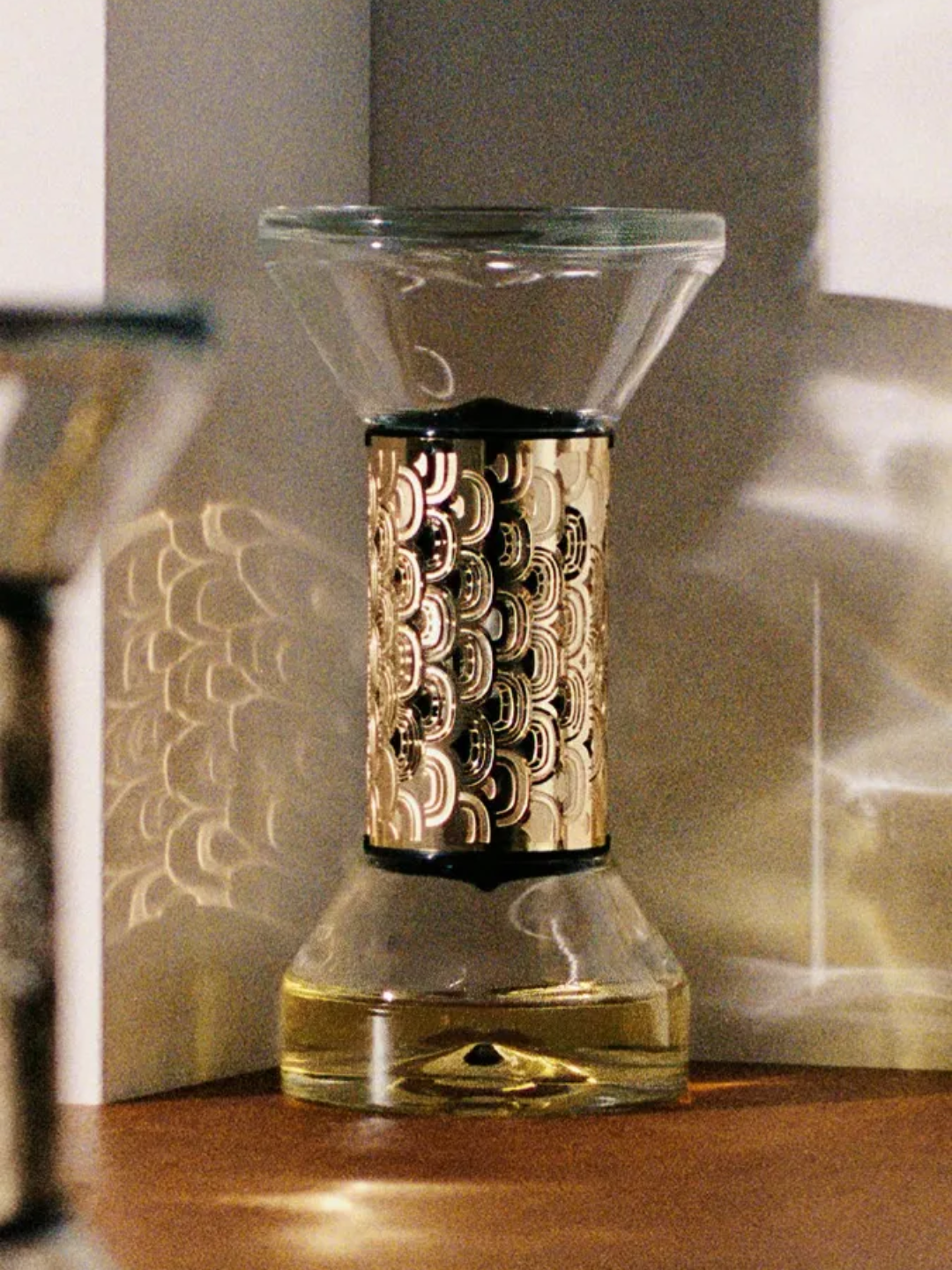 An hourglass diffuser from Diptyque
