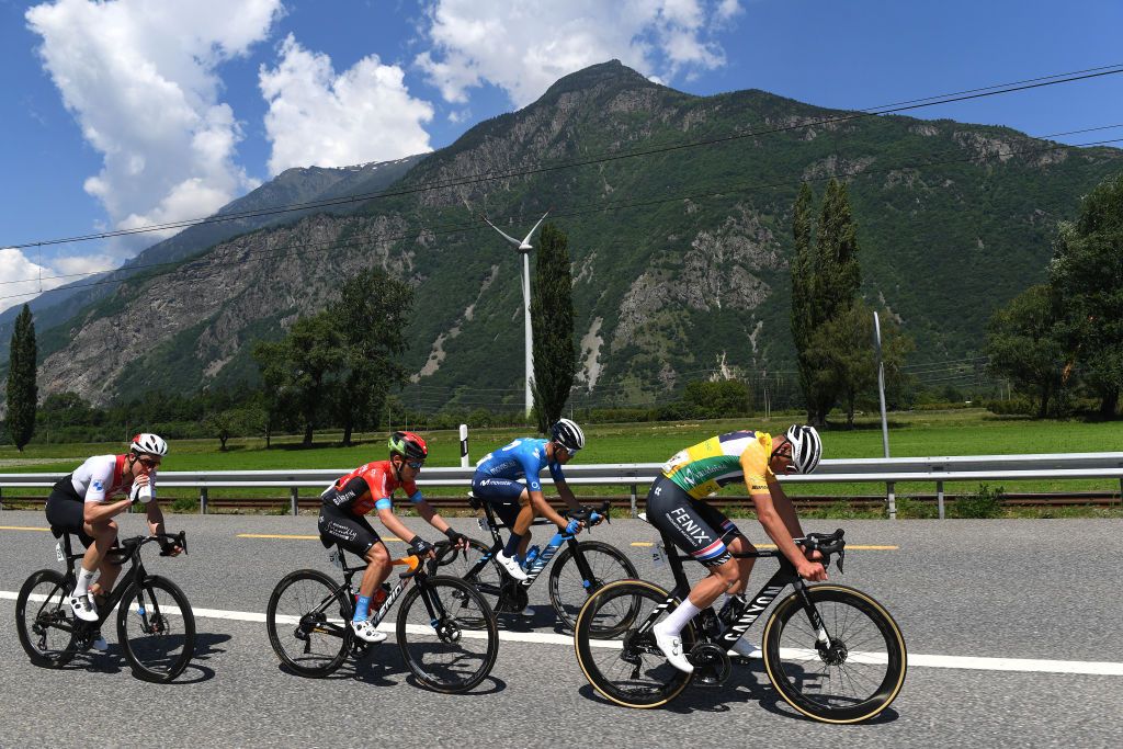 LEUKERBAD SWITZERLAND JUNE 10 Claudio Imhof of Switzerland and Team Switzerland Sergio Samitier Samitier of Spain and Movistar Team Hermann Pernsteiner of Austria and Team Bahrain Victorious Mathieu Van Der Poel of Netherlands and Team AlpecinFenix Yellow Leader Jersey in the Breakaway during the 84th Tour de Suisse 2021 Stage 5 a 1752km stage from Gstaad to Leukerbad 1385m UCIworldtour tds tourdesuisse on June 10 2021 in Leukerbad Switzerland Photo by Tim de WaeleGetty Images