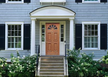 Exterior walls in a lighter shade than the shutters