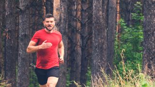 Man running in the woods