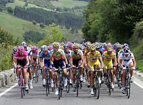 The peloton climbs through the Spanish countryside