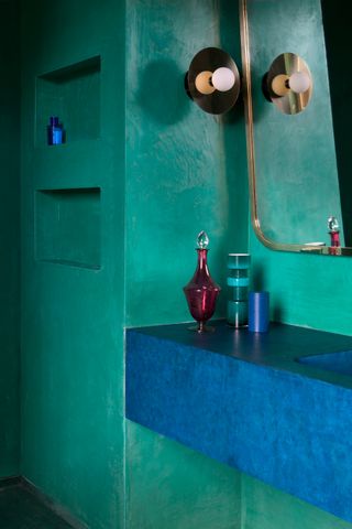 a colorful bathroom with tadelakt walls