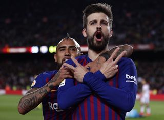 Gerard Pique celebrates scoring Barca's equaliser