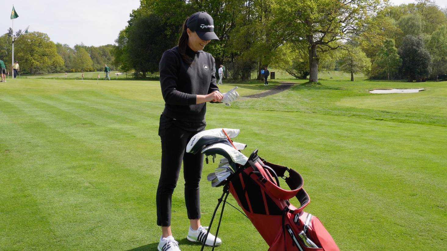 Jess Ratcliffe putting glove on
