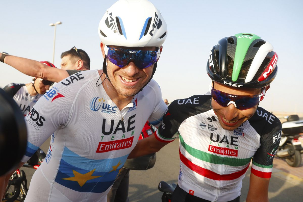 Alexander Kristoff celebrates with UAE Team Emirates teammate Fabio Aru