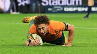 Australias Mark Nawaqanitawase scores a try ahead of the upcoming Australia vs New Zealand Rugby Championship match