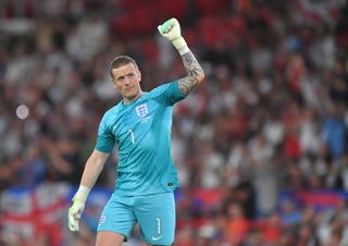 England's Jordan Pickford celebrates his sides 7-0 victory during the UEFA EURO 2024 qualifying round group C match between England and North Macedonia at Old Trafford on June 19, 2023 in Manchester, England. (Photo by Dave Howarth - CameraSport via Getty Images)