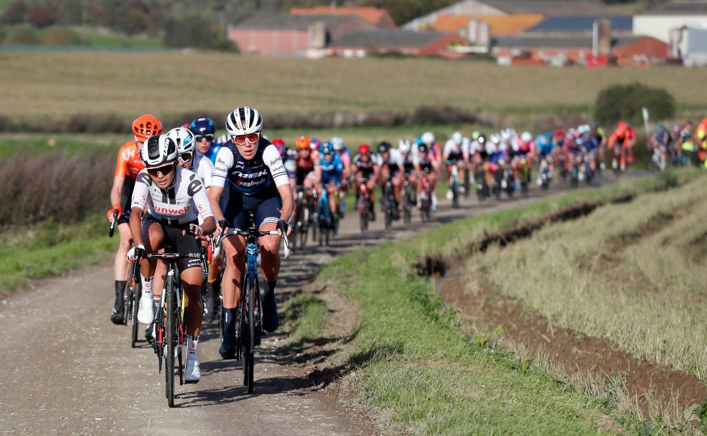 WEVELGEM BELGIUM OCTOBER 11 Coryn Rivera of The United States and Team Sunweb Ellen Van Dijk of The Netherlands and Team Trek Segafredo Peloton during the 9th GentWevelgem In Flanders Fields 2020 Women Elite a 1414km race from Ieper to Wevelgem GentWevelgem FlandersClassic on October 11 2020 in Wevelgem Belgium Photo by Bas CzerwinskiGetty Images