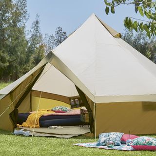 tent house in garden with cushion