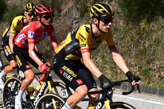 LACRUZDELINARES SPAIN SEPTEMBER 14 LR Sepp Kuss of The United States Red Leader Jersey and Jonas Vingegaard of Denmark and Team JumboVisma compete during the 78th Tour of Spain 2023 Stage 18 a 1789km stage from Pola de Allande to La Cruz de Linares 840m UCIWT on September 14 2023 in La Cruz de Linares Spain Photo by Tim de WaeleGetty Images