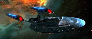 Sovereign-class starship, registry NCC-1701-E, commanded by Jean-Luc Picard. Enterprise-E appeared in the films "Star Trek: First Contact," "Star Trek: Insurrection," and "Star Trek Nemesis." Heavily damaged in "Star Trek Nemesis," it returned to Earth for refitting in spacedock.