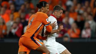 Virgil van Dijk and Robert Lewandowski tussling for the ball in a recent Poland vs Netherlands game