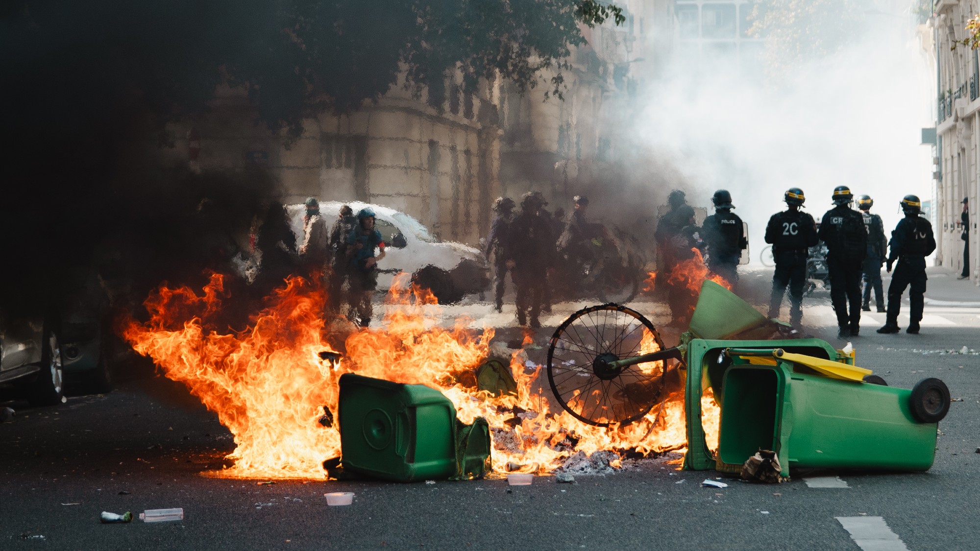 Protesters set bins and bikes on fire in protest against education system