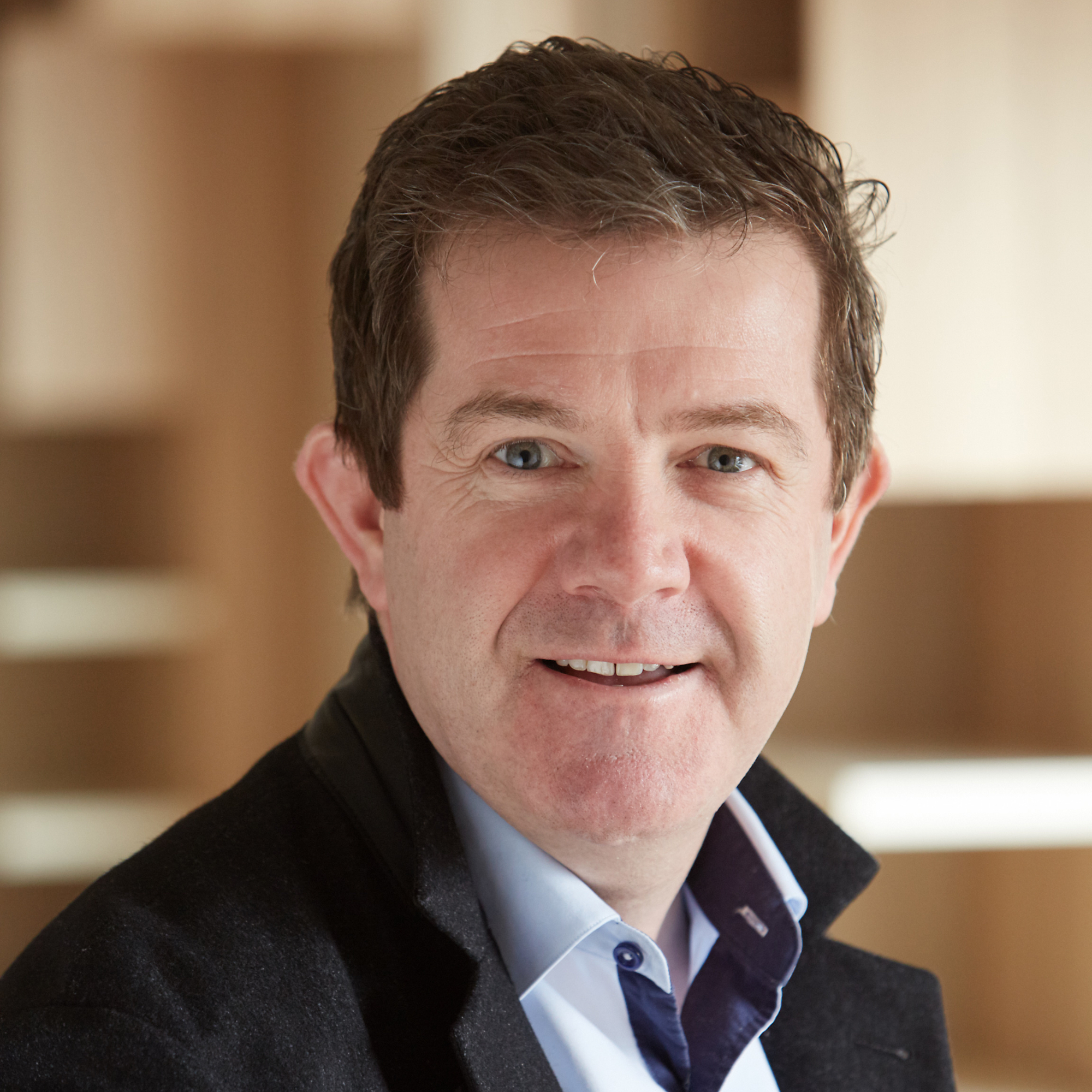 headshot of Tom Howley