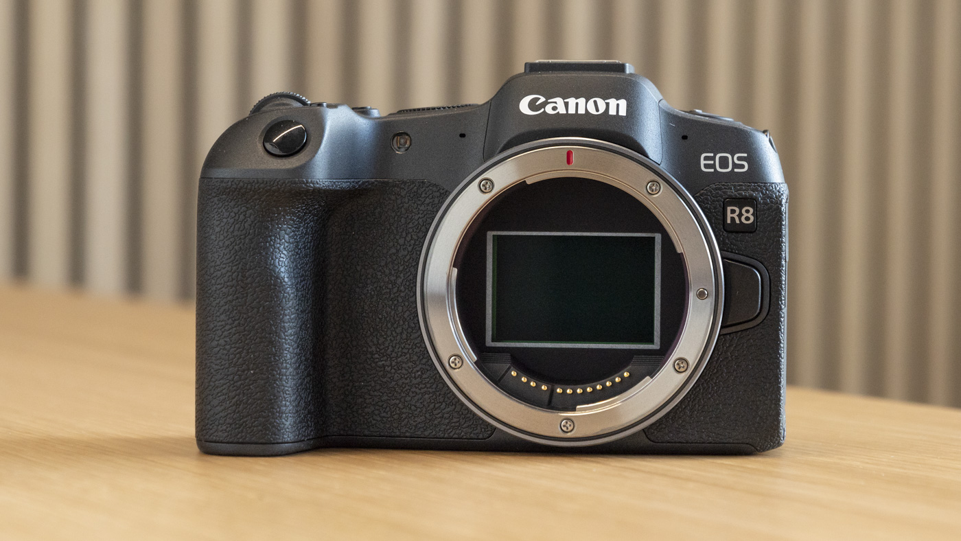 Canon EOS R8 on table without full-frame lens and sensor