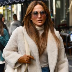 Jennifer Lopez swapped her black leggings for a brown pair, a matching sweatshirt, and white sneakers