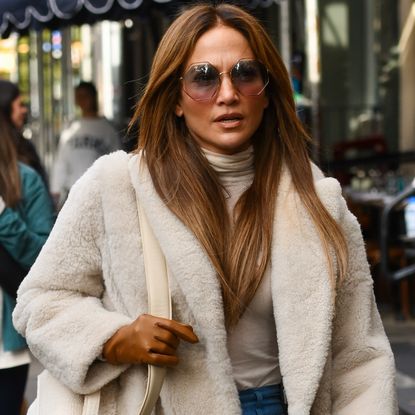 Jennifer Lopez swapped her black leggings for a brown pair, a matching sweatshirt, and white sneakers
