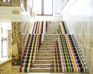 The artist worked with framing company John Jones to create a 20-metre cascade made entirely from contemporary bespoke frame mouldings over which visitors can walk.