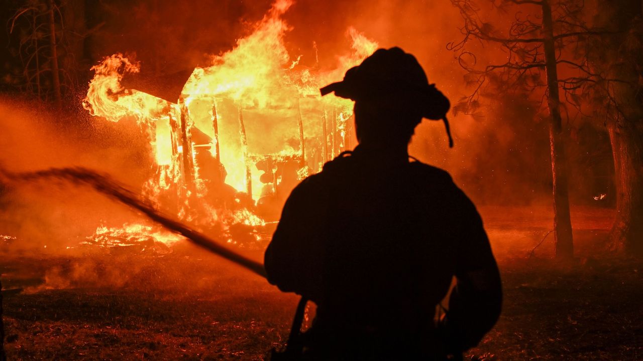 Fire crews try to extinguish a wildfire in Chico, California