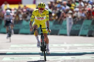 UAE Team Emirates team's Slovenian rider Tadej Pogacar cycles to the finish line of the 17th stage of the 111th edition of the Tour de France cycling race, 177,8 km between Saint-Paul-Trois-Chateaux and Superdevoluy, southern France, on July 17, 2024. (Photo by Marco BERTORELLO / AFP)