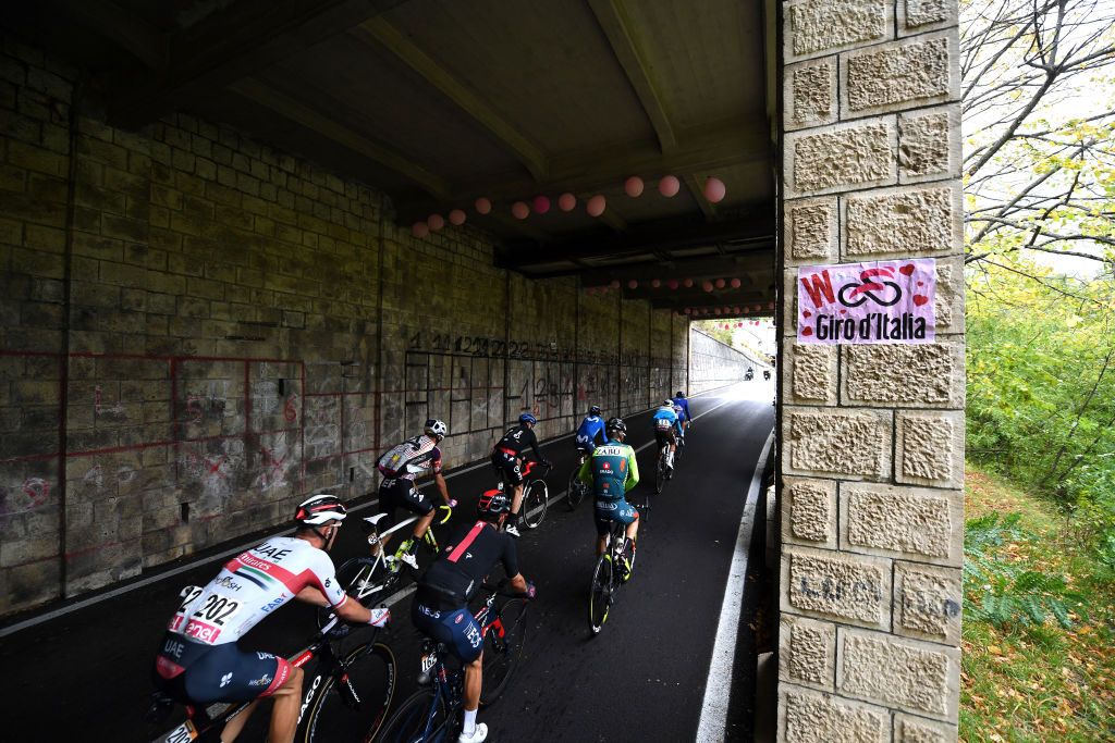 ROCCARASO ITALY OCTOBER 11 Larry Warbasse of The United States and Team Ag2R La Mondiale Ruben Guerreiro of Portugal and Team EF Pro Cycling Kilian Frankiny of Switzerland and Team Groupama FDJ Eduardo Sepulveda of Argentina and Movistar Team Ben Oconnor of Australia and NTT Pro Cycling Team Jonathan Castroviejo of Spain and Team INEOS Grenadiers Mikkel Bjerg of Denmark and UAE Team Emirates Giovanni Visconti of Italy and Team Vini Zabu KTM Breakaway Tunnel Logo Landscape during the 103rd Giro dItalia 2020 Stage 9 a 207km stage from San Salvo to Roccaraso Aremogna 1658m girodiitalia Giro on October 11 2020 in Roccaraso Italy Photo by Tim de WaeleGetty Images