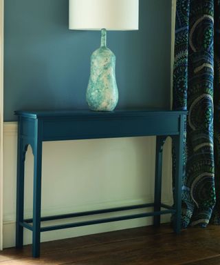 William Yeoward blue console table with large table lamp