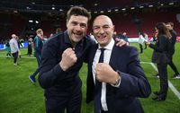 Mauricio Pochettino and Daniel Levy pose together after a game.