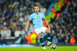 Nathan Ake centre-back of Manchester City and Netherlands controls the ball during the UEFA Champions League 2024/25 League Knockout Play-off first leg match between Manchester City and Real Madrid C.F. at Manchester City Stadium on February 11, 2025 in Manchester, United Kingdom.