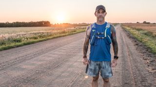 Male runner wearing hydration pack