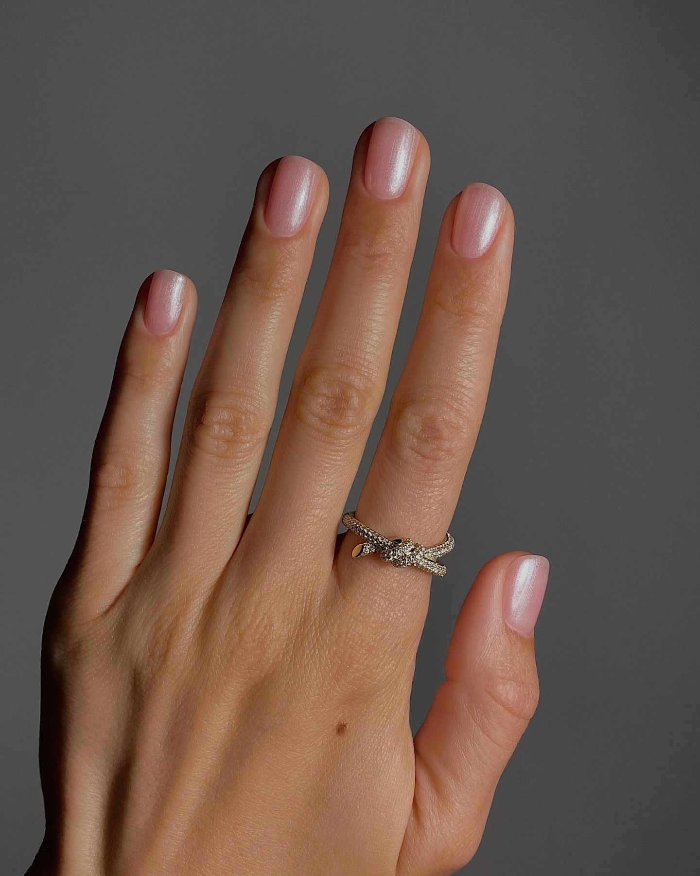 Short nails with soft pink sheer chrome