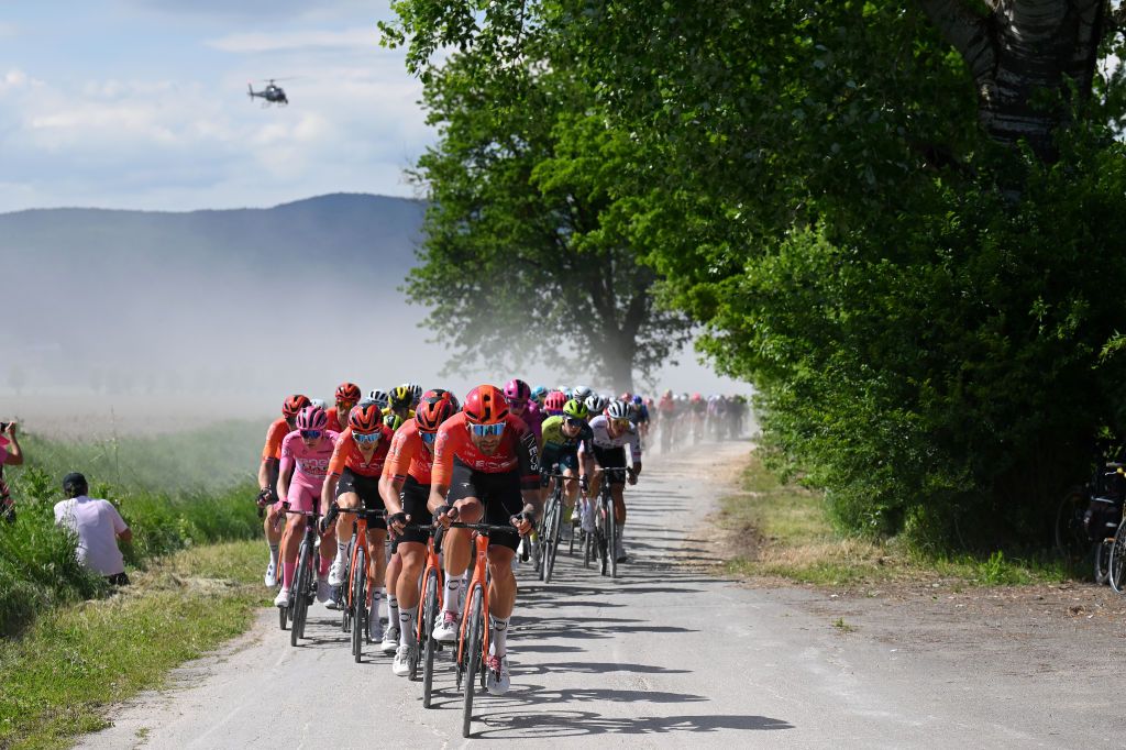 RAPOLANO TERME ITALY MAY 09 LR Tadej Pogacar of Slovenia and UAE Team Emirates Pink Leader Jersey Geraint Thomas of The United Kingdom and Filippo Ganna of Italy and Team INEOS Grenadiers compete during the 107th Giro dItalia 2024 Stage 6 a 180km stage from Viareggio to Rapolano terme 322m UCIWT on May 09 2024 in Rapolano terme Italy Photo by Tim de WaeleGetty Images