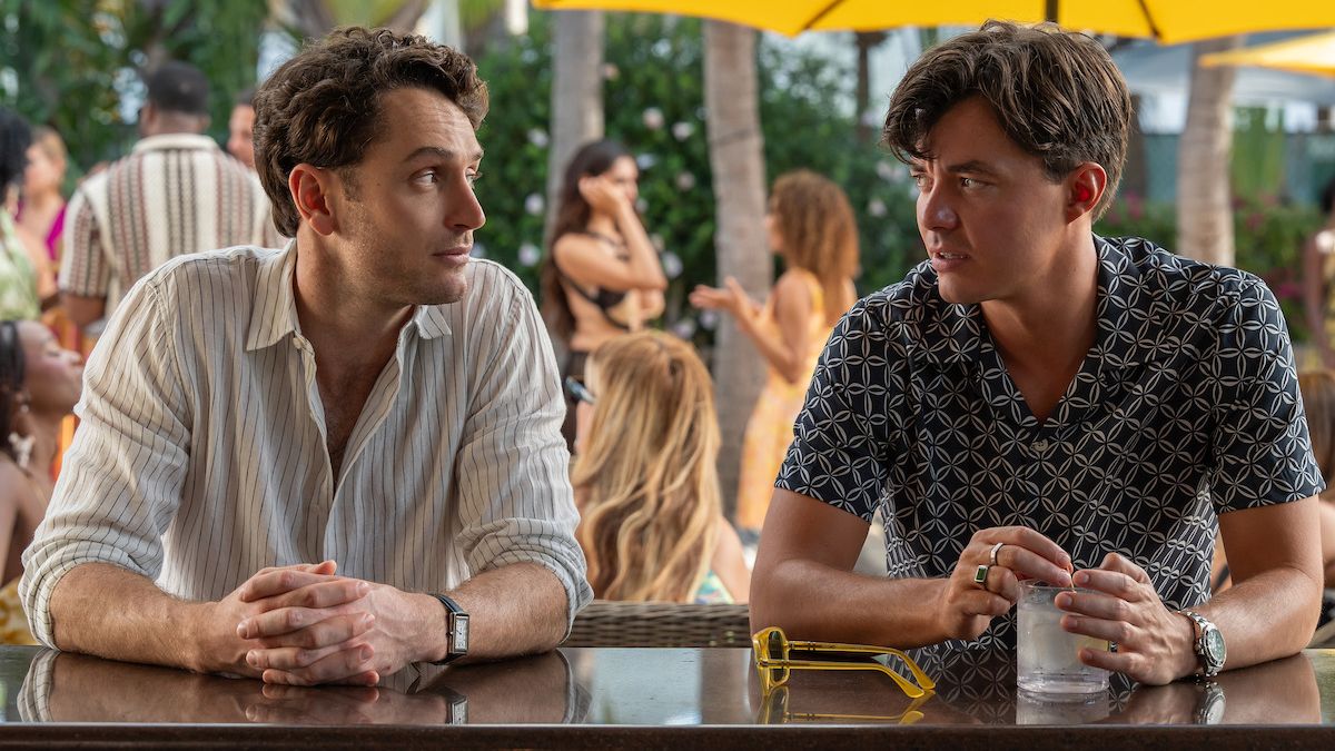 Xander (Colin Woodell) and Tom (Jack Bannon) catch up at a bar off-duty in Netflix's "Pulse."