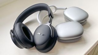 Bose QuietComfort Ultra Headphones with AirPods Max side-by-side