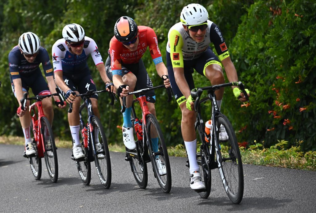 TrekSegafredo teams American rider Quinn Simons L QuickStep Alpha Vinyl Teams Danish rider Mikkel Honore 2nd L Bahrain Victorious teams Slovenian rider Matej Mohoric 2nd R and IntermarcheWantyGobert Materiaux teams Dutch rider Taco Van Der Hoorn R cycle in a breakaway during the 19th stage of the 109th edition of the Tour de France cycling race 1883 km between CastelnauMagnoac and Cahors in southwestern France on July 22 2022 Photo by AnneChristine POUJOULAT AFP Photo by ANNECHRISTINE POUJOULATAFP via Getty Images