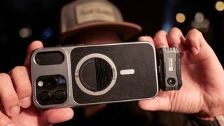 Thermal Master P1 attached to a phone.