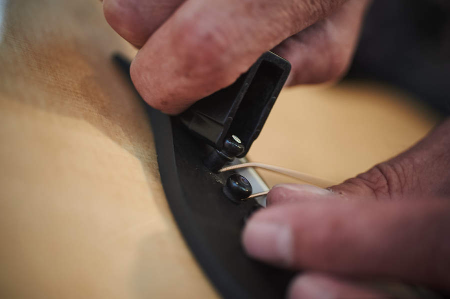 Restringing a guitar