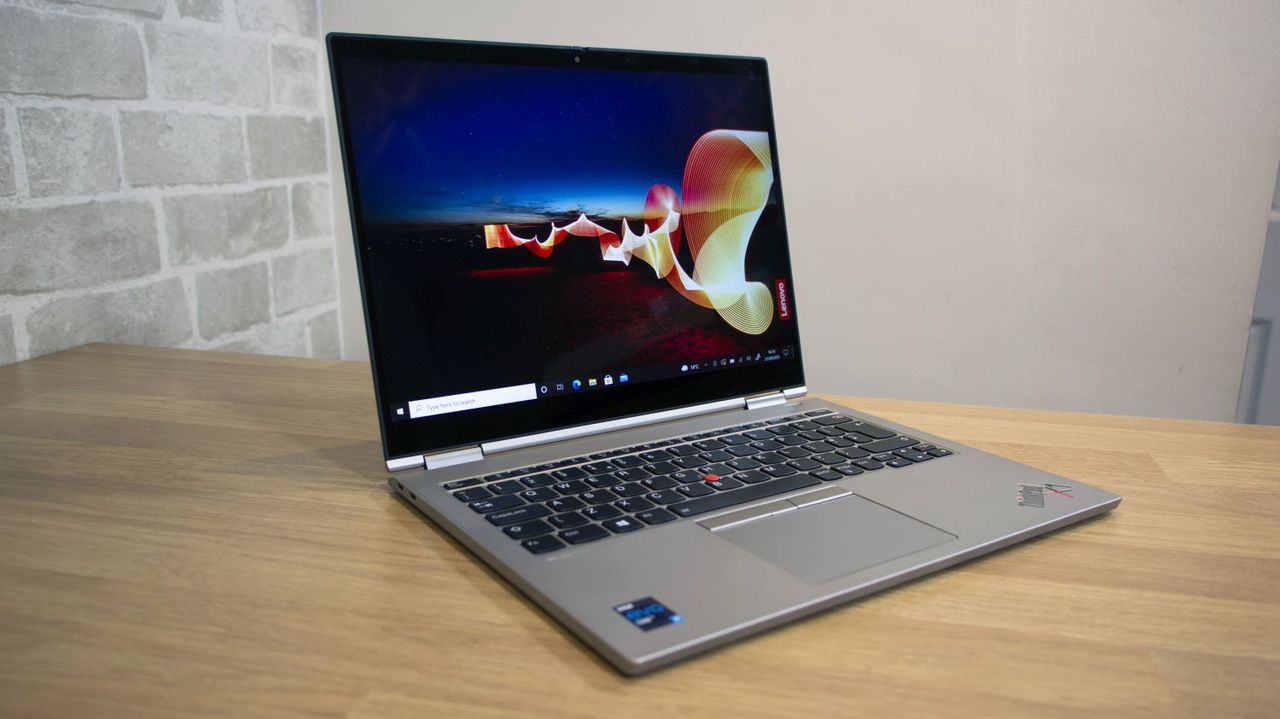 A photograph of the Lenovo ThinkPad X1 Titanium Yoga on a table