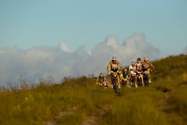 Christoph Sauser and Burry Stander lead the early morning pack
