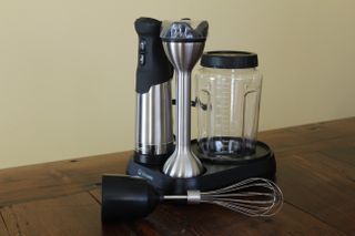 The attachments of the Vitamix Immersion Blender arrange on the handy base