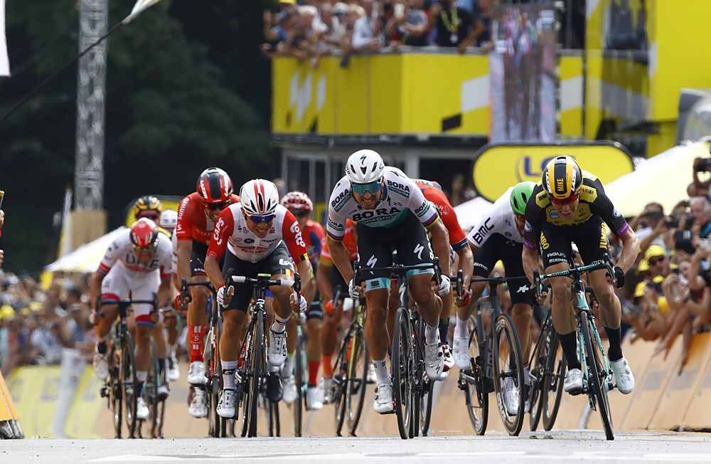 Mike Teunissen (Jumbo-Visma) beats Peter Sagan (Bora-Hansgrohe) and Caleb Ewan (Lotto Soudal) to win the opening stage at the Tour de France in Brussels