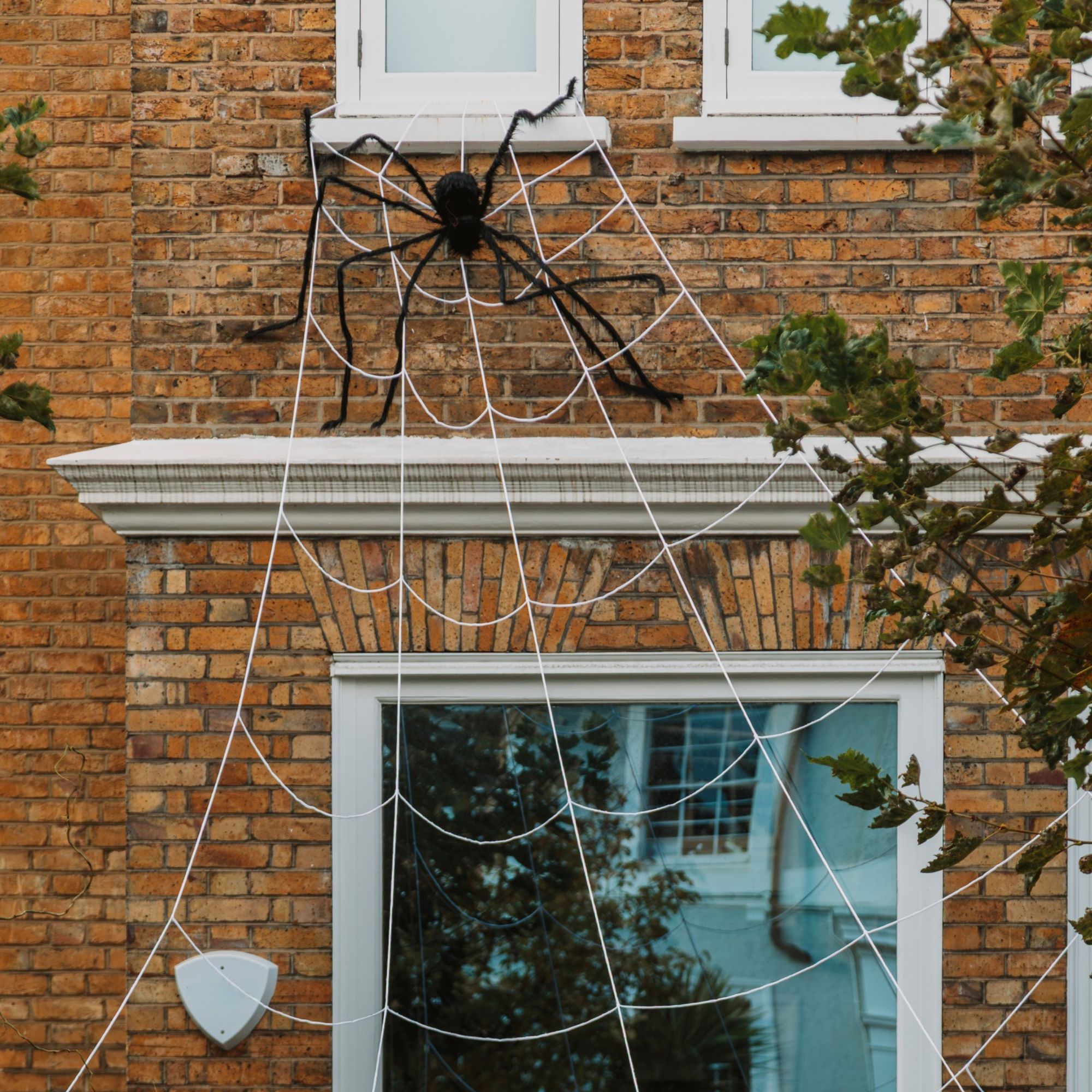 A spider web decoration on a house