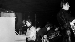 GERMANY - JANUARY 01: Photo of Stuart SUTCLIFFE and BEATLES and Pete BEST and John LENNON; L-R. Pete Best, Paul McCartney (at piano), George Harrison, John Lennon, Stuart Sutcliffe performing live onstage at 'Top Ten Club' (Photo by Ellen Piel - K & K/Redferns)