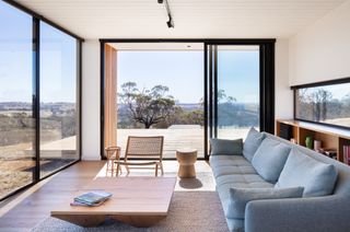 Living area with views of surrounding landscape