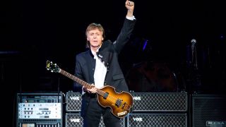 Sir Paul McCartney performs using one of his Hofner basses during his One on One Tour at Little Caesars Arena on October 1, 2017 in Detroit, Michigan