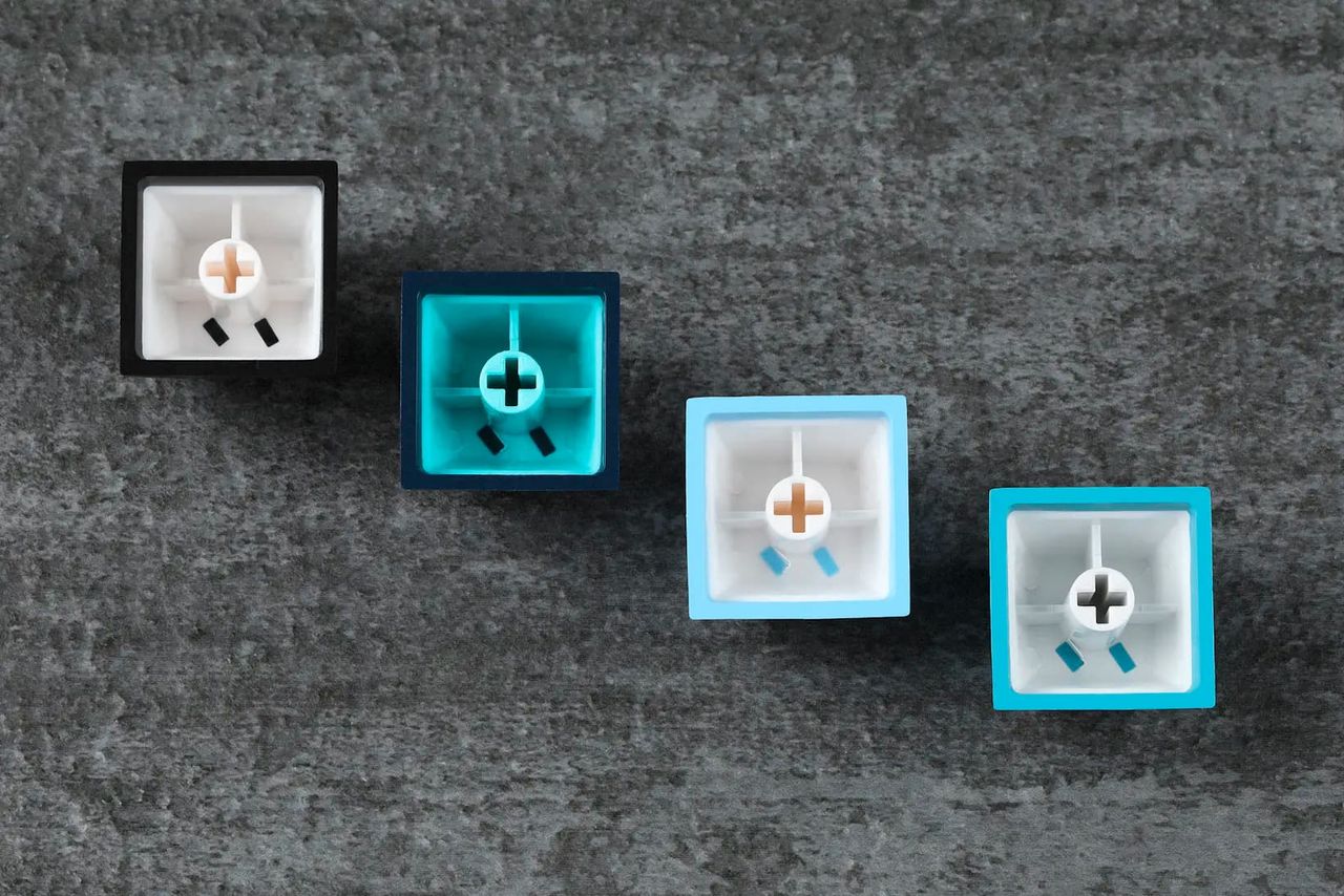 four cat themed keycaps