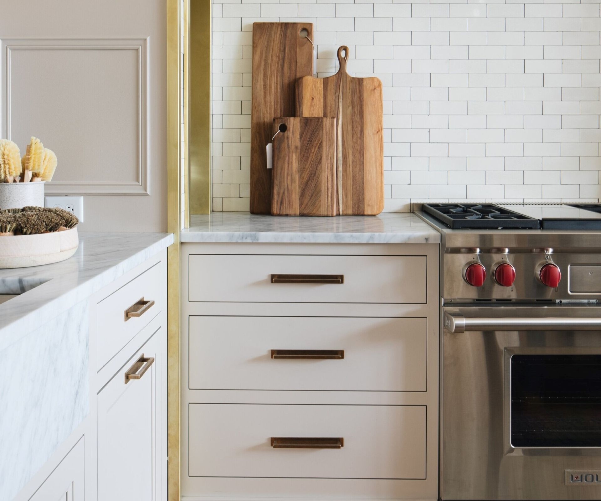 A closeup of classic painted kitchen cabinets